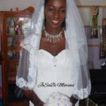 Bride wearing a custom ivory JoSaBi Mariées wedding dress