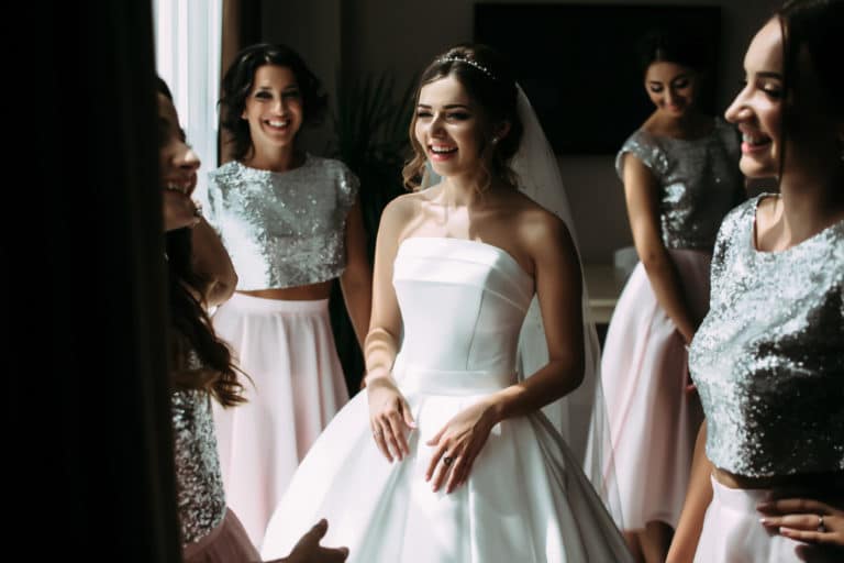 Bride in a straight neckline wedding gown on the JoSaBi blog