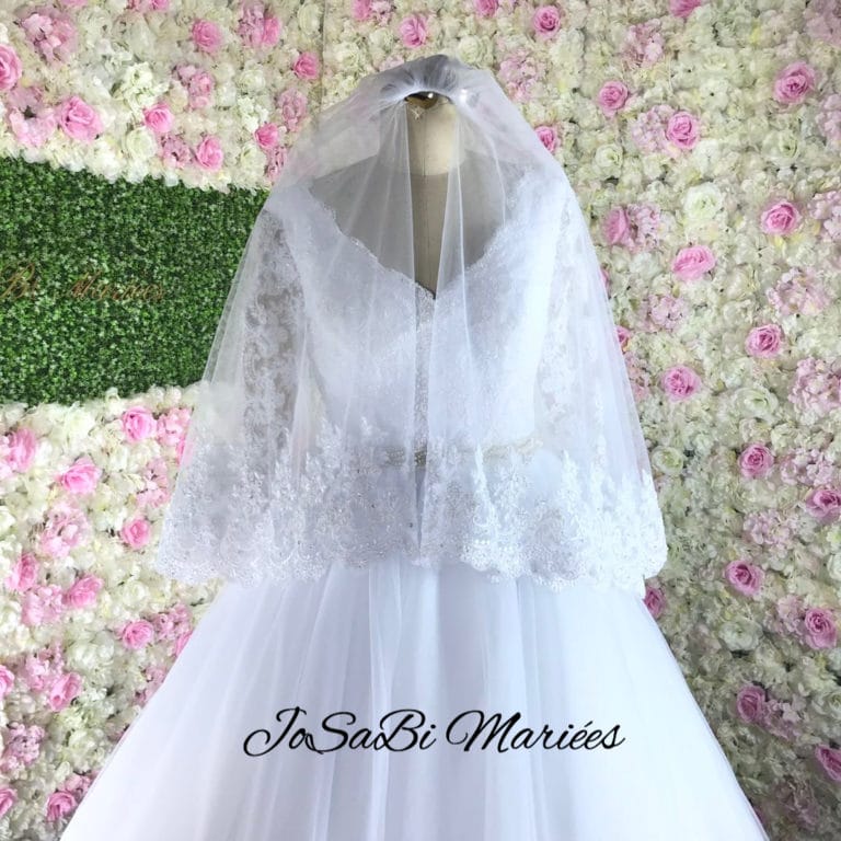 Tagèle P. 's custom A line wedding dress and veil by JoSaBi Mariées