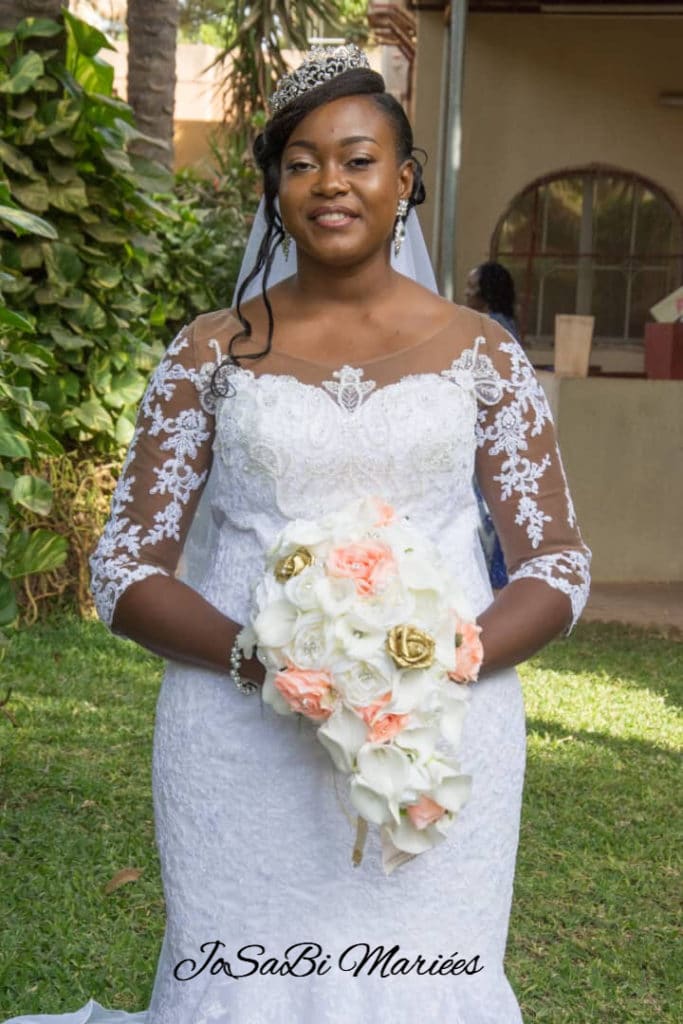 Aicha T wearing a custom mermaid wedding dress by JoSaBi Mariées