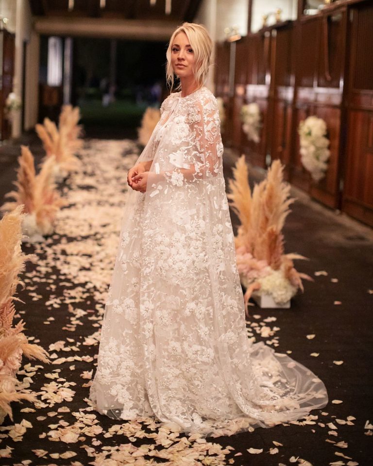 Kaley Cuoco rocking her off white wedding dress by Reem Acra