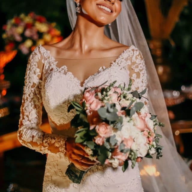 Bride in a V neck wedding gown on the JoSaBi blog