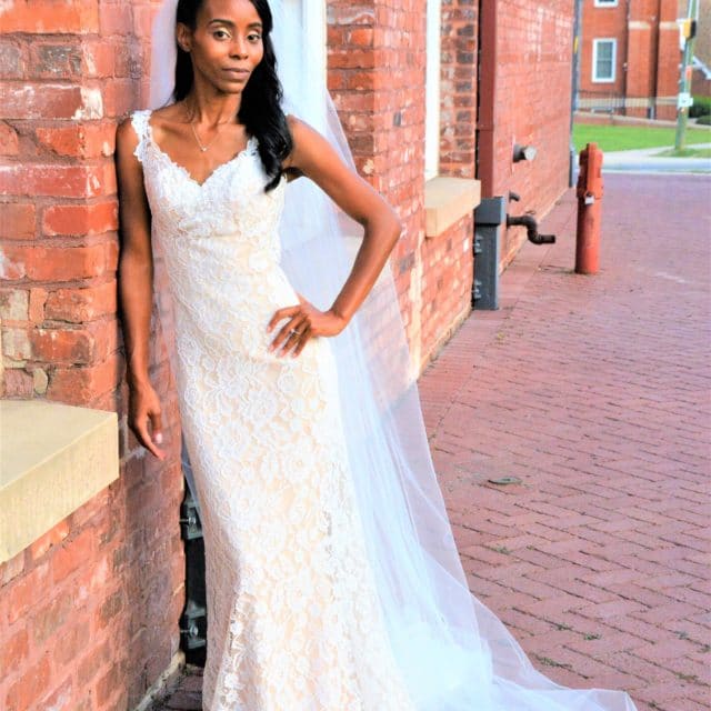 Bride in a V neck wedding gown on the JoSaBi blog