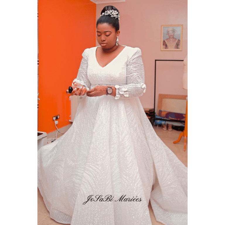 Sparkly wedding dress with long sleeves by JoSaBi