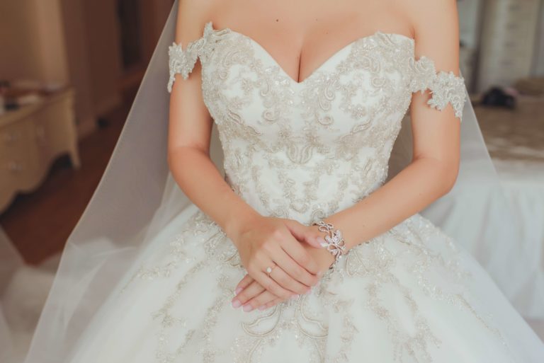 heavily beaded wedding dress with veil