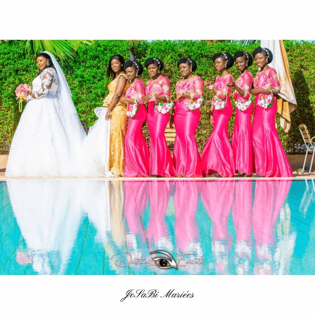 beautiful Bride surrounded by her bridesmaids