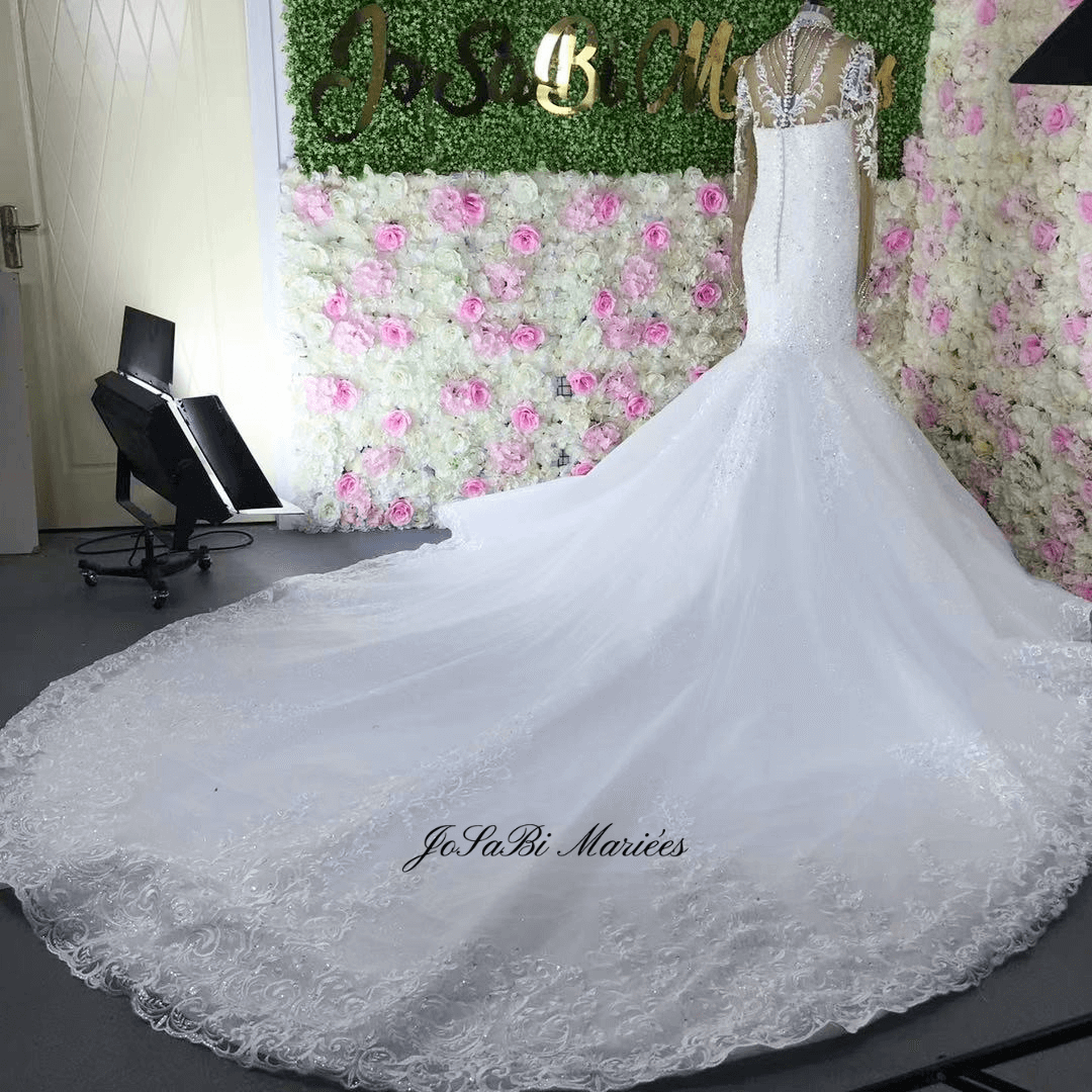 Bedazzled mermaid wedding dress long train